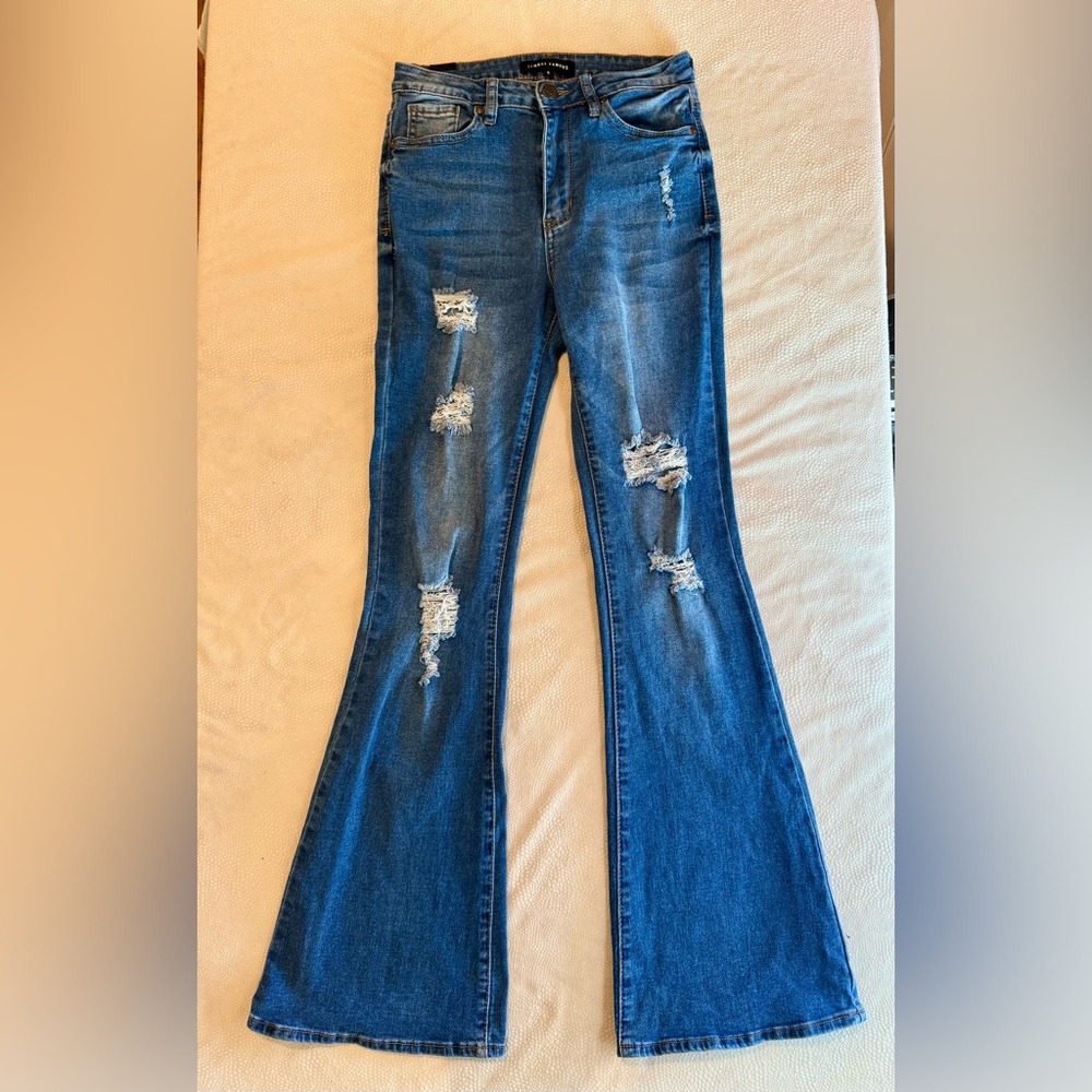 almost famous | Women's Blue Distressed Flare Jeans